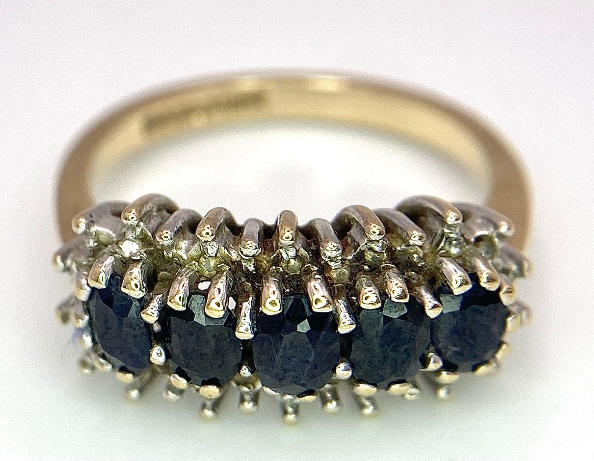 A 9K Yellow Gold Diamond and Sapphire Ring. Size M, 3.4g total weight. Ref: 8417 - Image 6 of 11