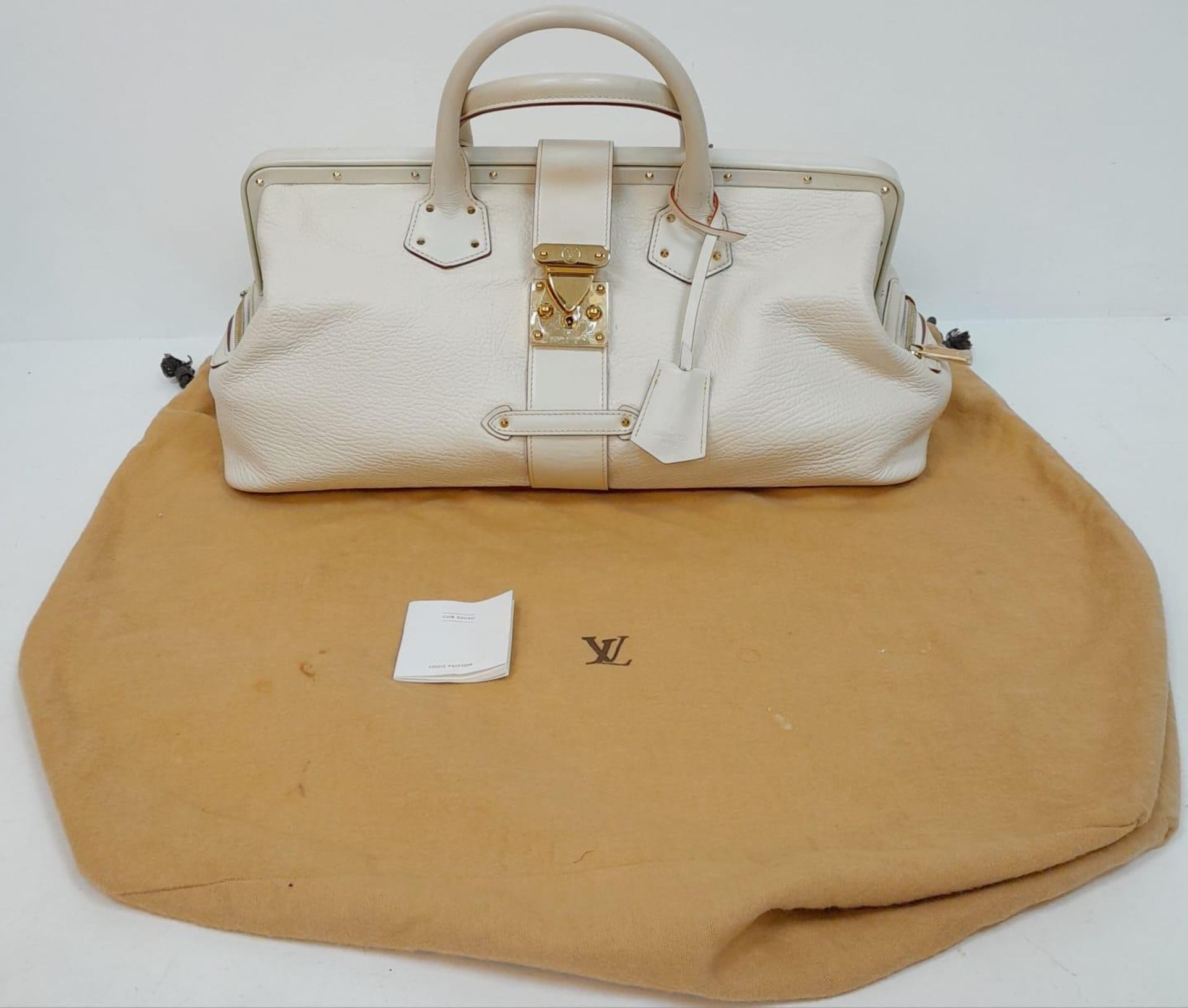 A Louis Vuitton Manhattan PM Suhali Leather Handbag. Soft white textured leather exterior with - Image 9 of 9