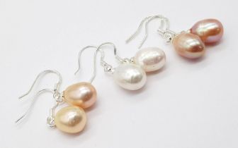 Three Pairs of Teardrop Shaped Pastel Coloured Freshwater Pearl Earrings. Set in 925 silver.