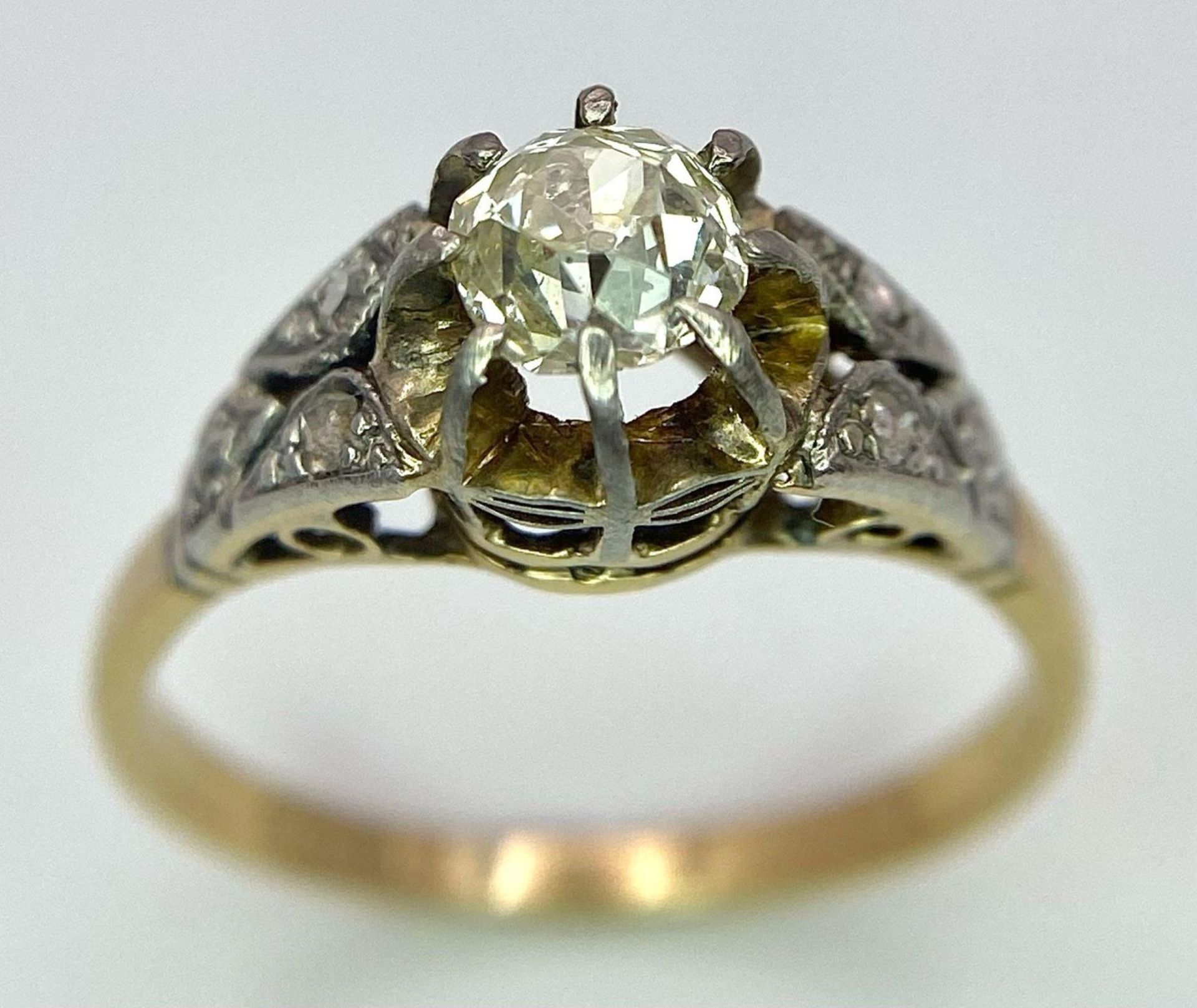 An Antique 18K Gold, Platinum and Diamond Ring. Central 0.75ct central stone with diamond accents on - Image 2 of 7