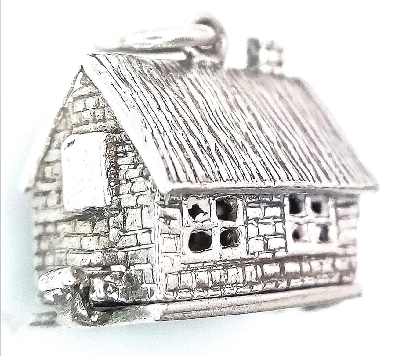 A Sterling Silver House Charm Which Opens. 1.8cm length, 5.7g total weight. Ref: SC 7094 - Image 8 of 9