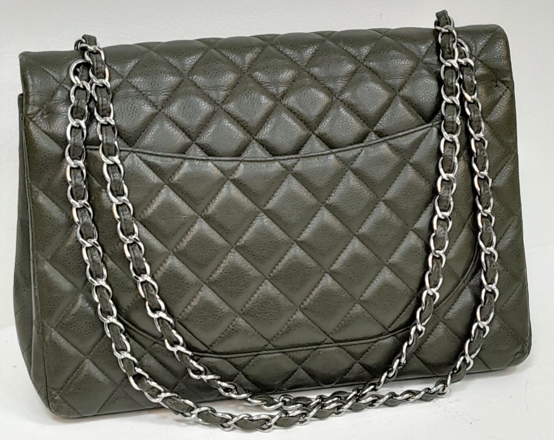 A Chanel Green Jumbo Classic Double Flap Bag. Quilted leather exterior with silver-toned hardware, - Image 4 of 14