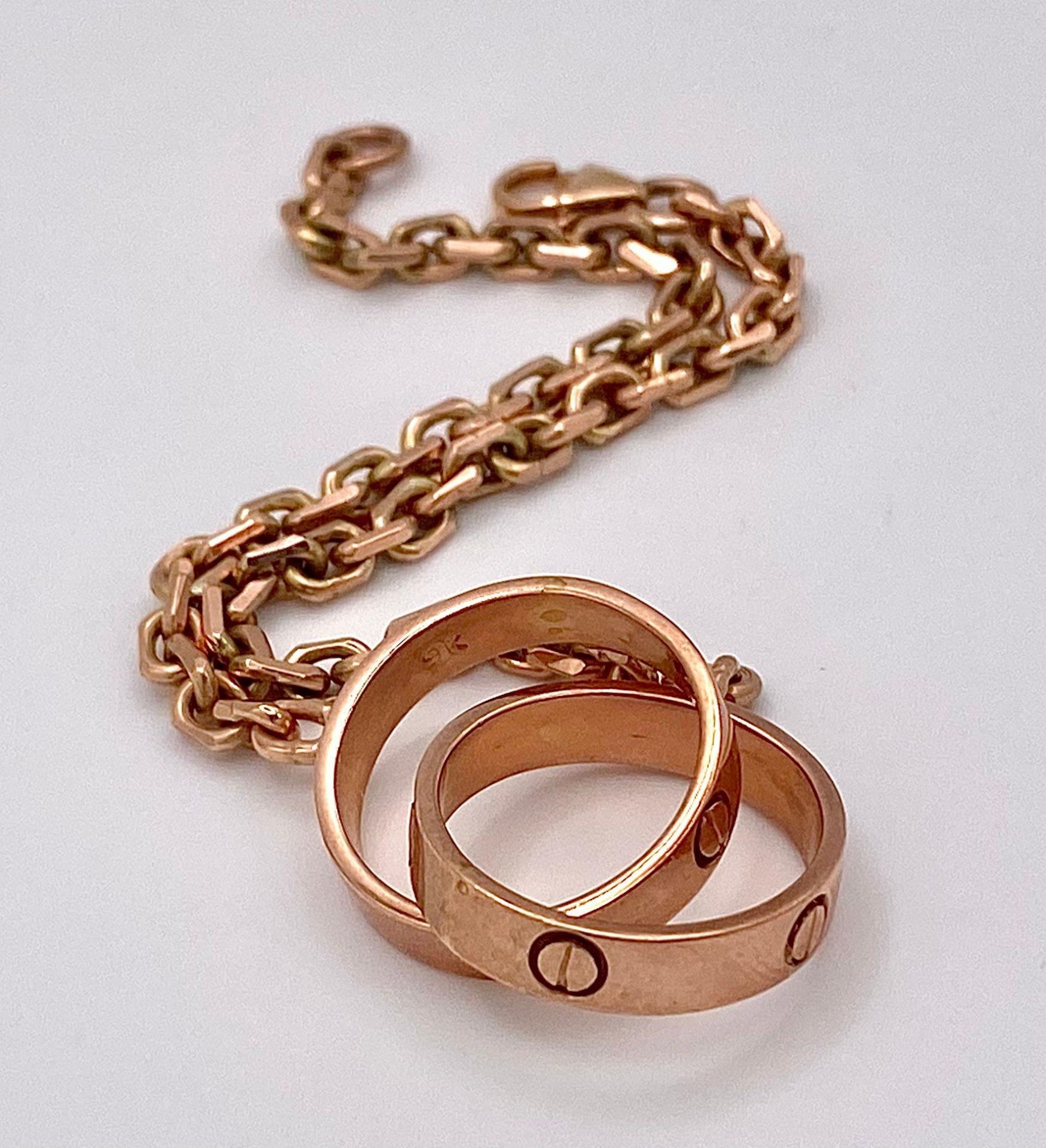 A 9K Rose Gold Entwined Ring Bracelet. 18cm length. 10.7g weight.