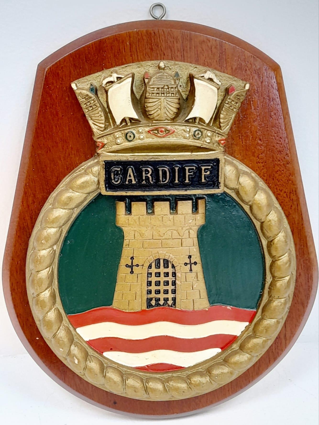 A Mounted Ships Tompion/Crest for HMS Cardiff. 28cm Length. HMS Cardiff was A Type 42 Destroyer that