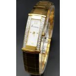 AN ORIGINAL KUTCHINSKY GOLD TONE BRACELET LADIES WATCH - WITH DIAMONDS SET EITHER SIDE OF THE