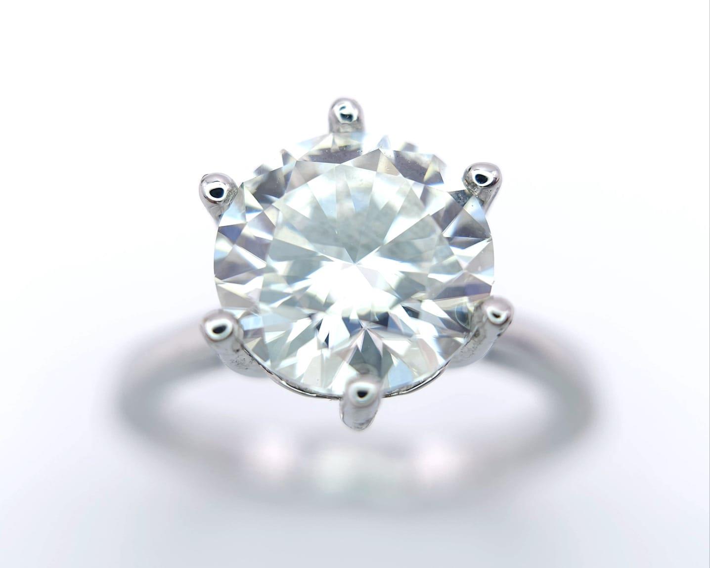 A sterling silver solitaire ring with a stunning round cut moissanite (3 carats), size: N, weight: - Image 3 of 13