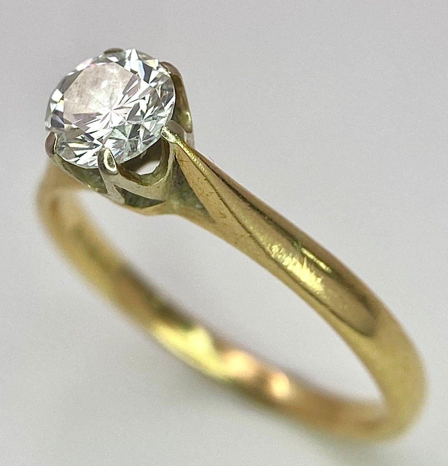 An 18K Yellow Gold Diamond Solitaire Ring. 0.75ct brilliant round cut diamond. Size N. 2.65g total - Image 2 of 6