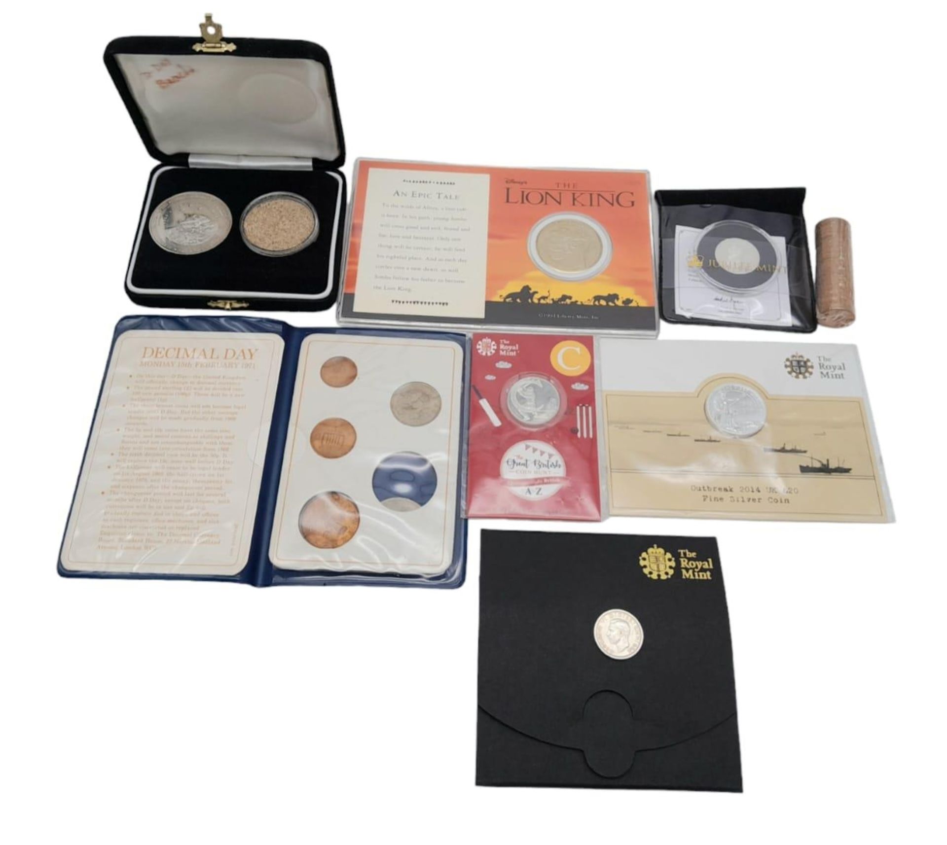 A collection of commemorative coins in proof or uncirculated condition to include "D day beach