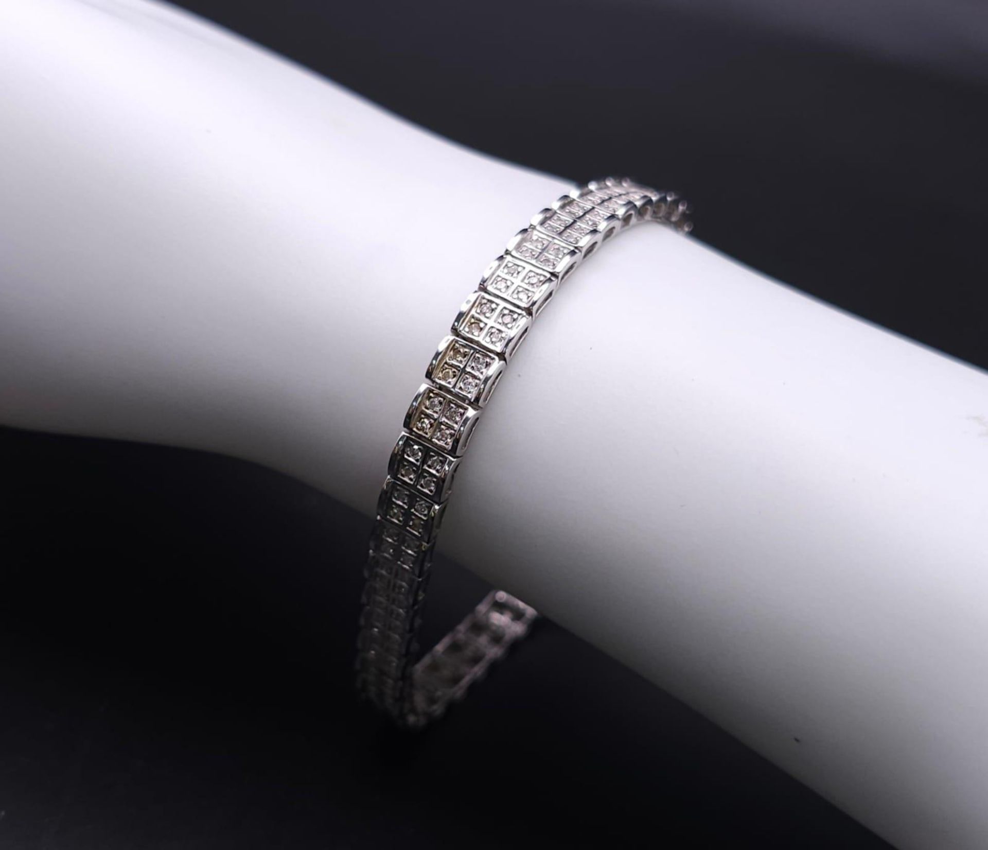 A 9K White Gold Diamond Set Bracelet, with Under Safety Catch Fitting. 1ctw, 19cm length, 12.7g - Image 4 of 14