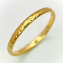 A 22K Yellow Gold Band Ring. 2mm width. Size M. 1.65g weight.