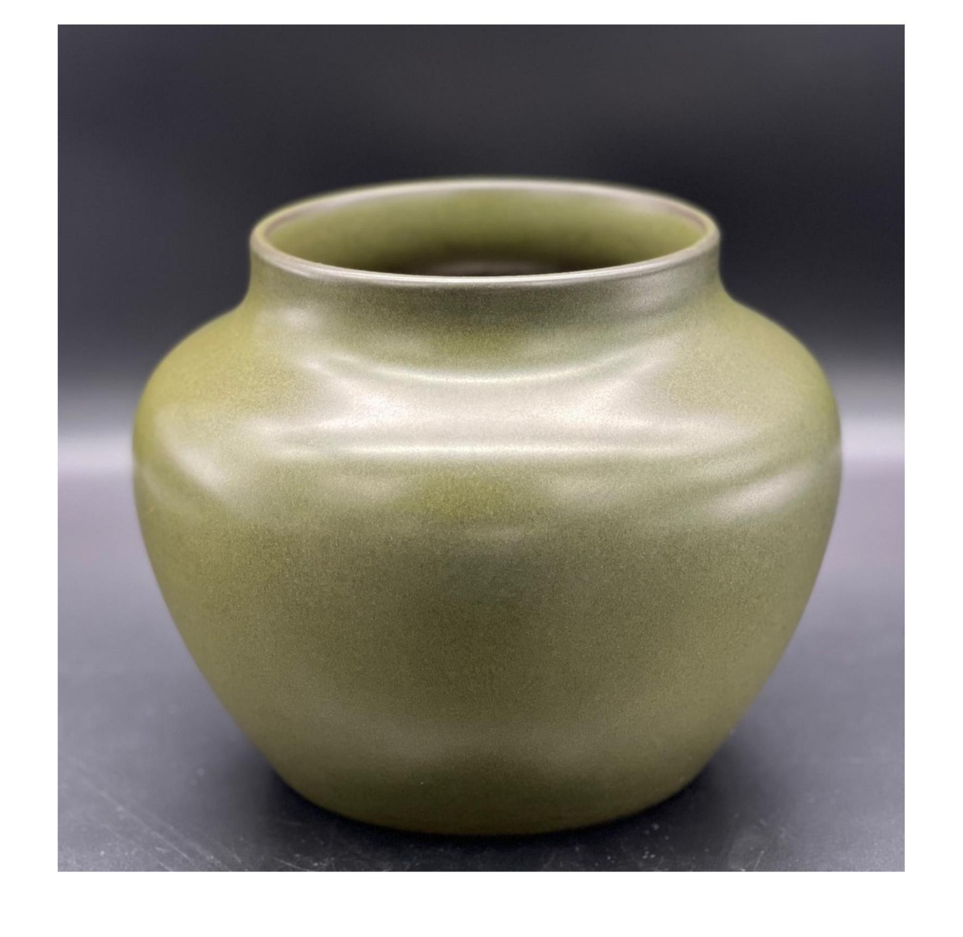 A Tea-Dust glazed jar, with Qing dynasty Emperor Qian Long mark. Diameter of Top 15cm, Diameter of