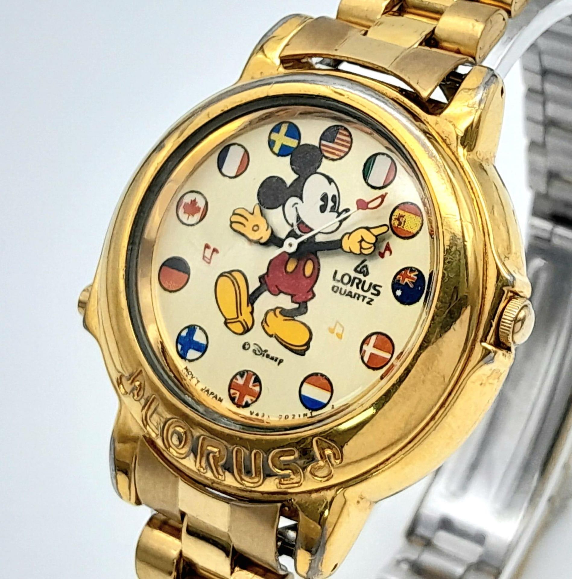 A Lorus Mickey Mouse Musical Quartz Watch. Gilded stainless steel bracelet and case - 34mm. MM - Bild 2 aus 7