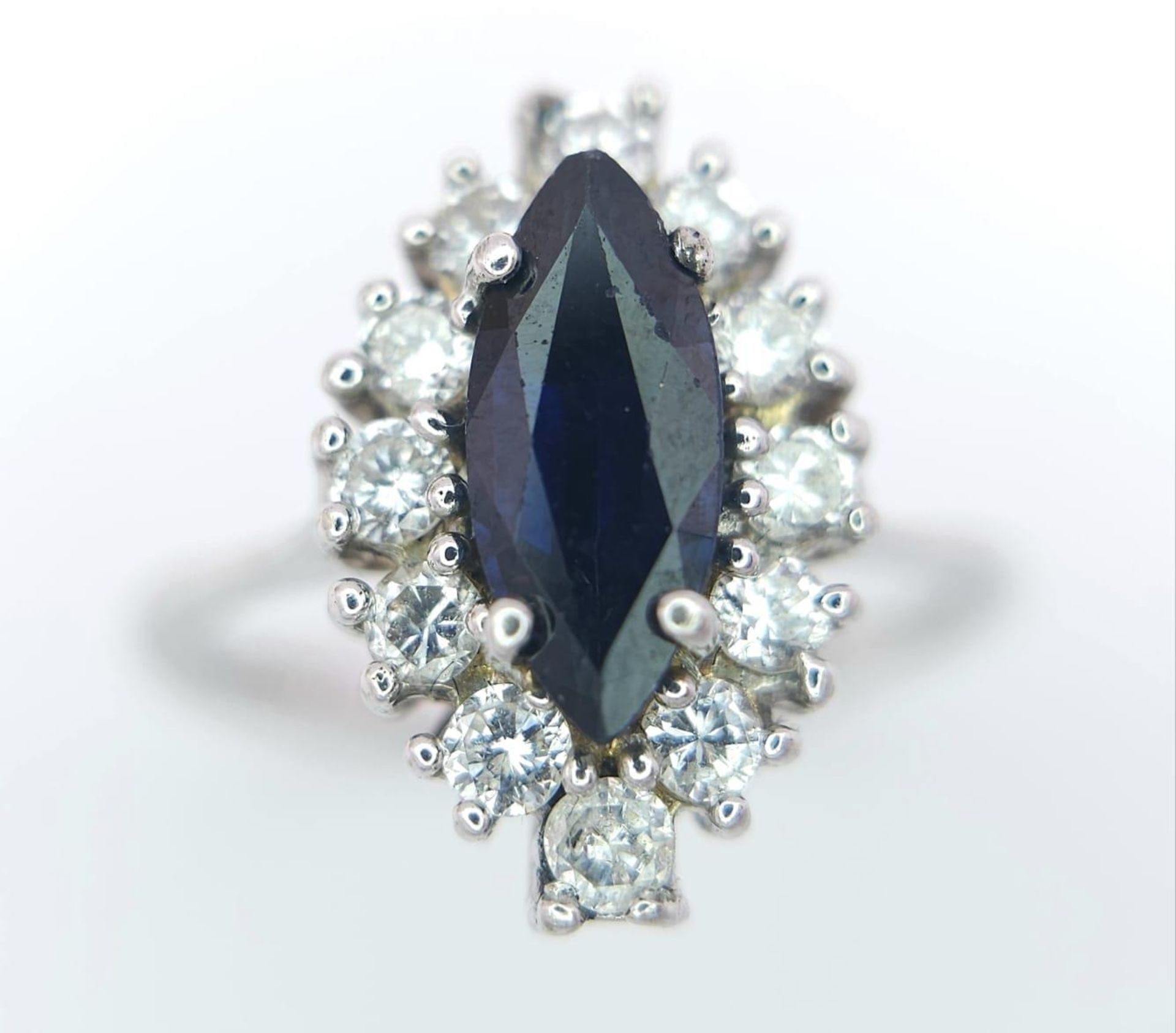 AN 18K WHITE GOLD DIAMOND & SAPPHIRE MARQUISE SHAPE RING. 0.40CTW OF DIAMONDS AND A 1.20CT - Bild 2 aus 6