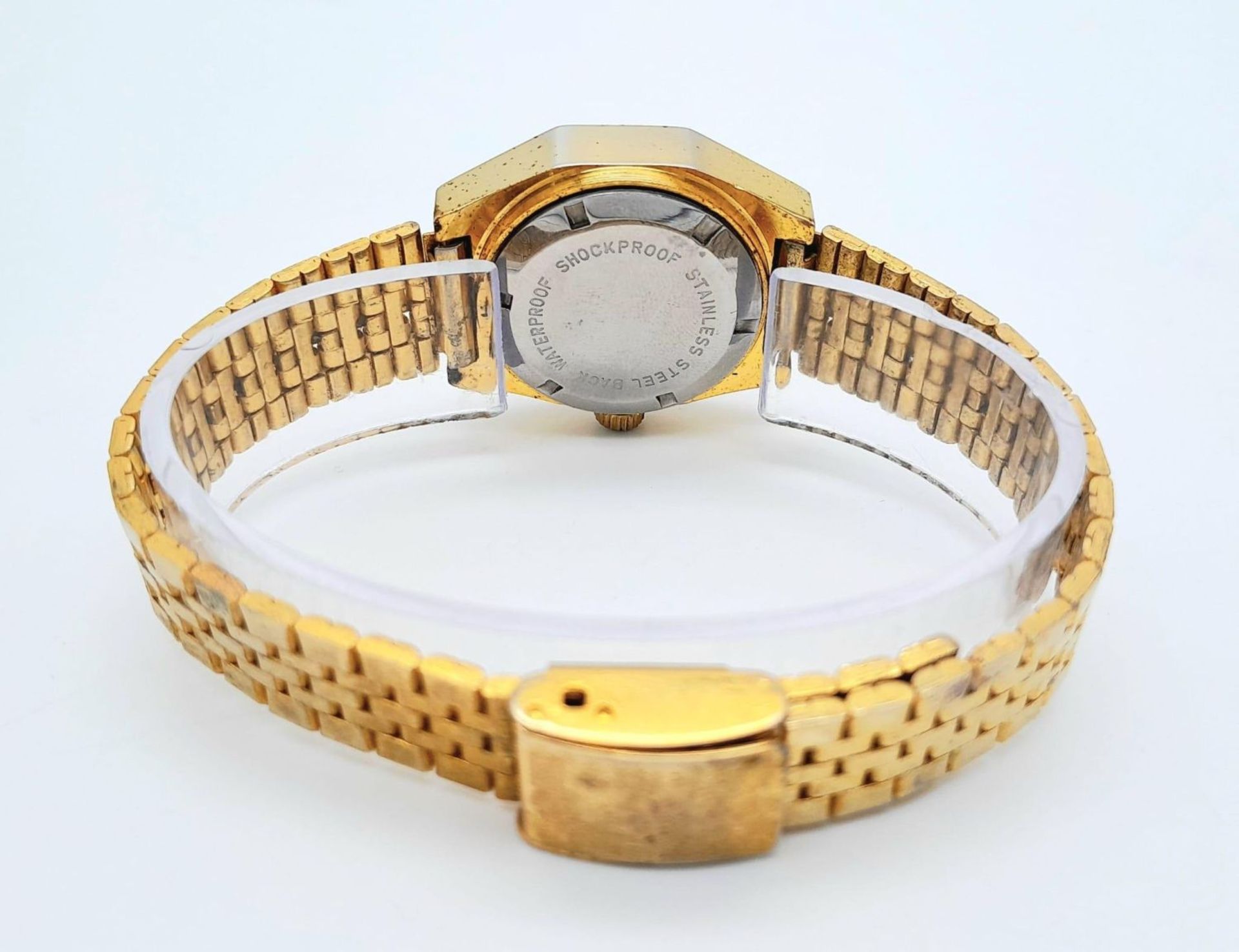 A Classic Vintage Omax Ladies Mechanical Jump Watch. Gilded bracelet and case - 26mm. Gold tone dial - Image 9 of 12