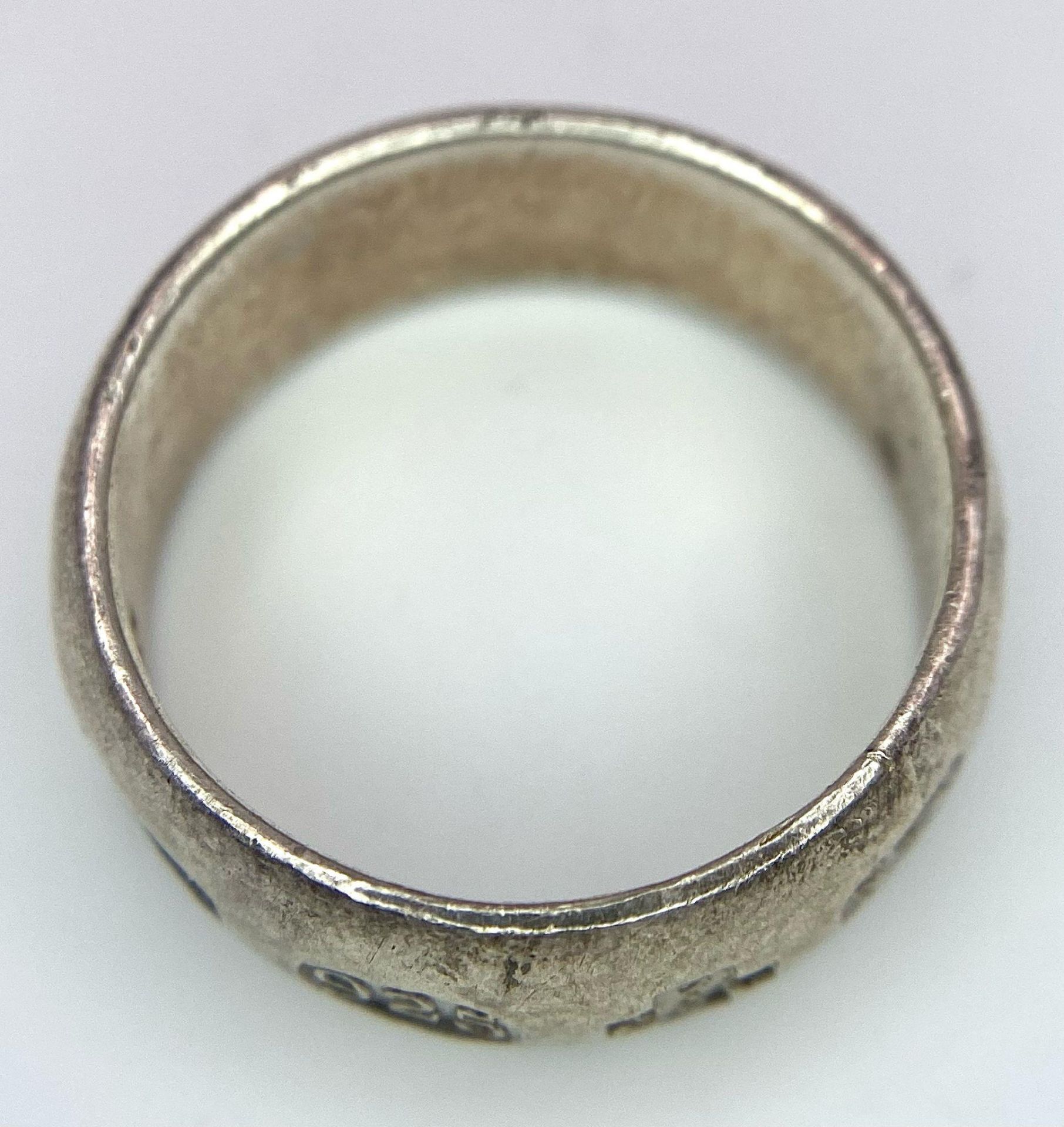 A vintage sterling silver band ring with full Sheffield Millennium hallmarks. Total weight 8.88G. - Image 6 of 7