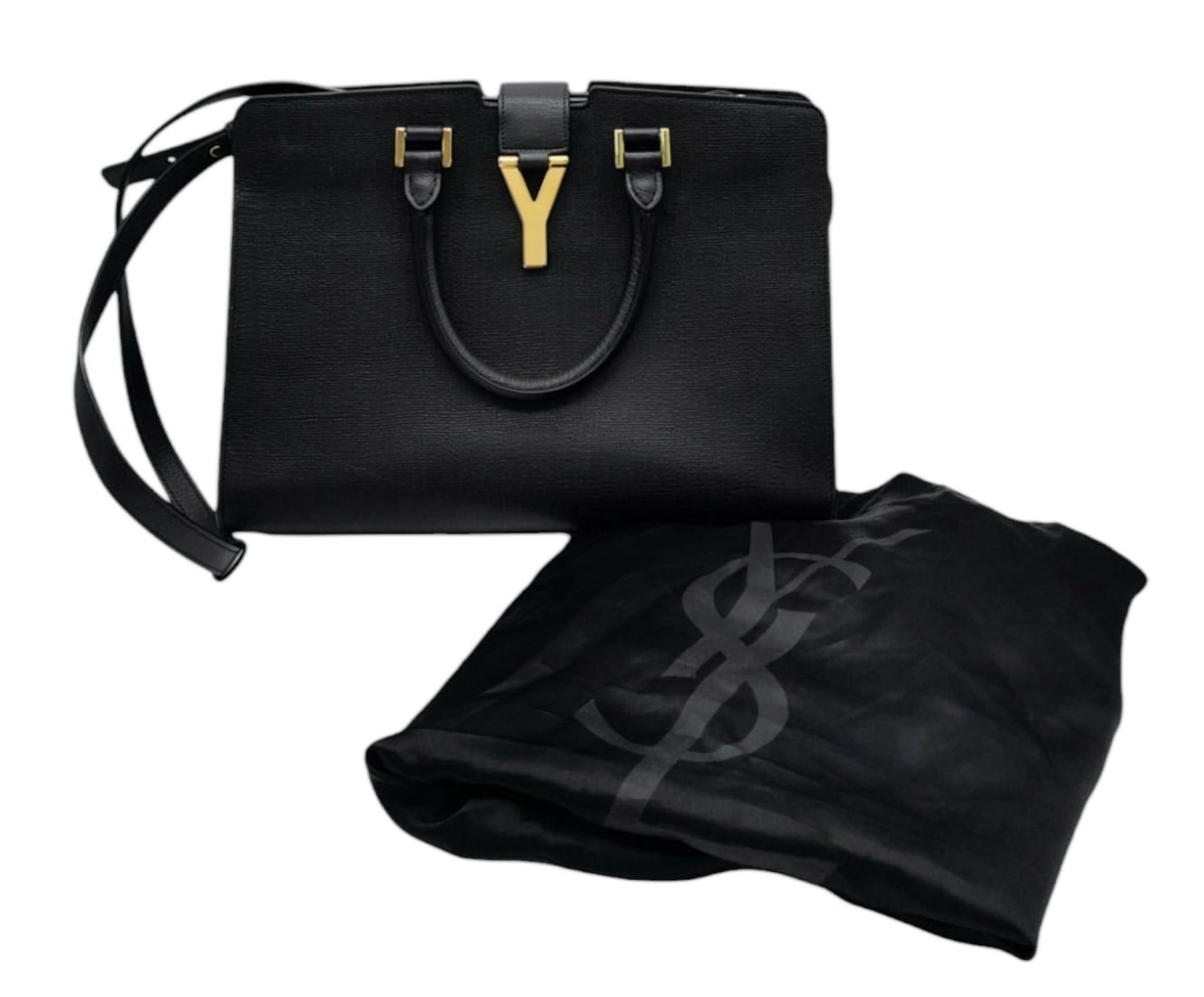 An Yves Saint Laurent Black 'Cabas' Handbag. Leather exterior with gold-toned hardware, two rolled - Bild 2 aus 8