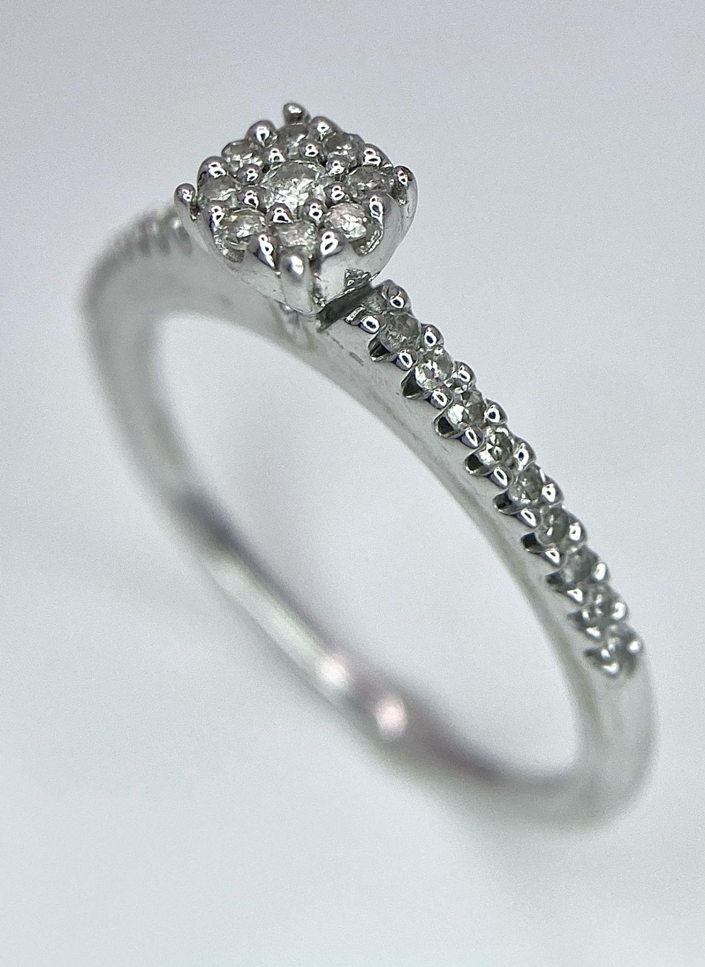 A 9K White Gold Diamond Cluster Ring. 0.15ctw, size L, 2g total weight. Ref: 8411 - Image 4 of 11