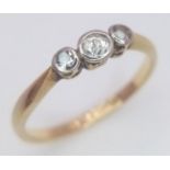 An antique 18 K yellow gold ring with a trilogy of old cut diamonds. Size: M, weight: 1.9 g.