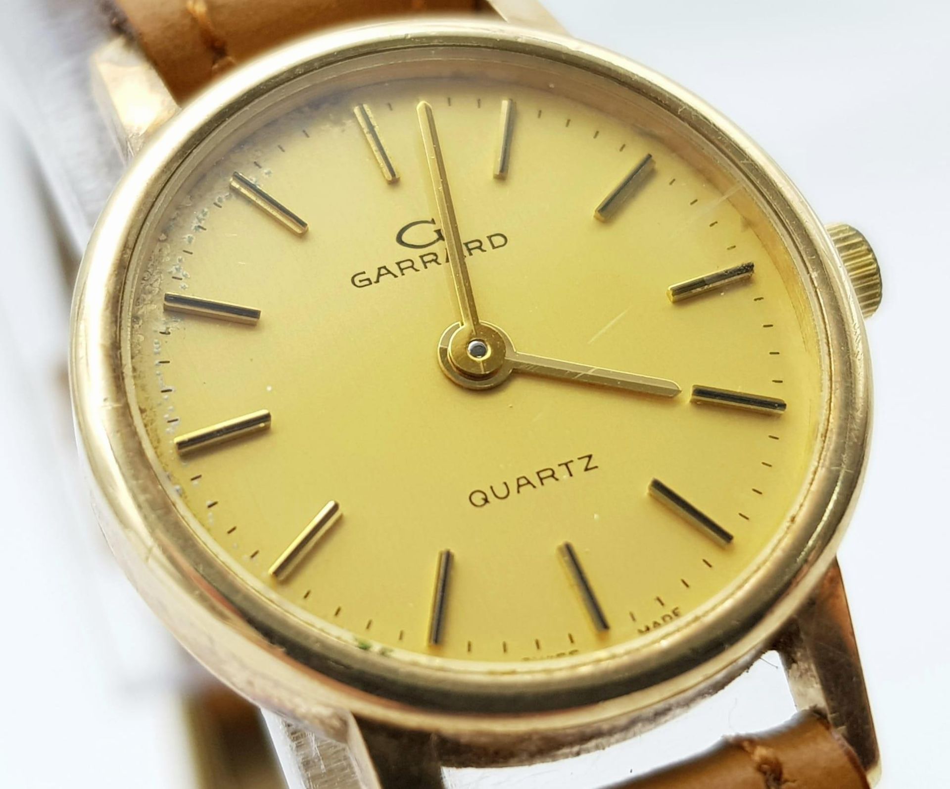 A Garrard 9K Gold Cased Quartz Ladies Watch. New brown leather strap. 9k gold case - 22mm. Gold tone - Image 3 of 6