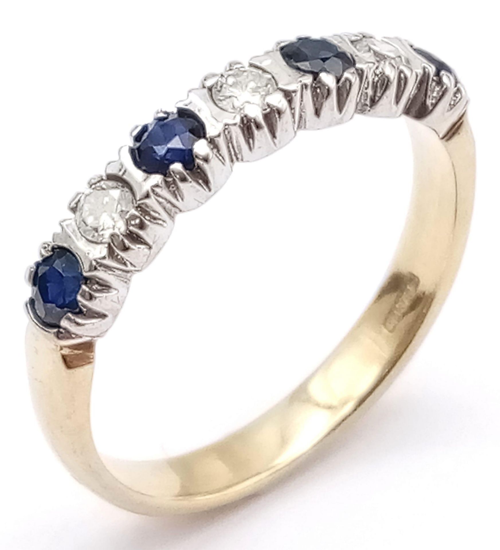 A 9K Yellow Gold, Sapphire and Diamond Half Eternity Ring. Size I. 1.7g