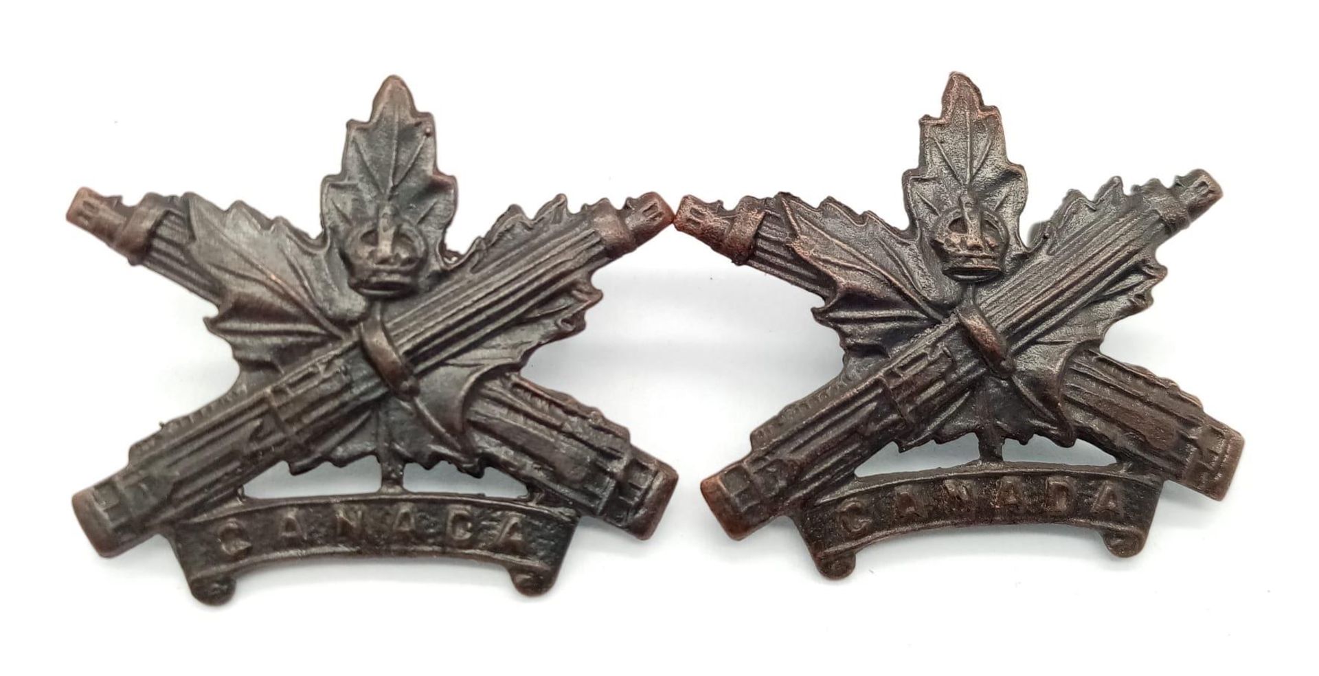 WW1 Canadian Expeditionary Force Collar Badges. Canadian Machine Gun Corps