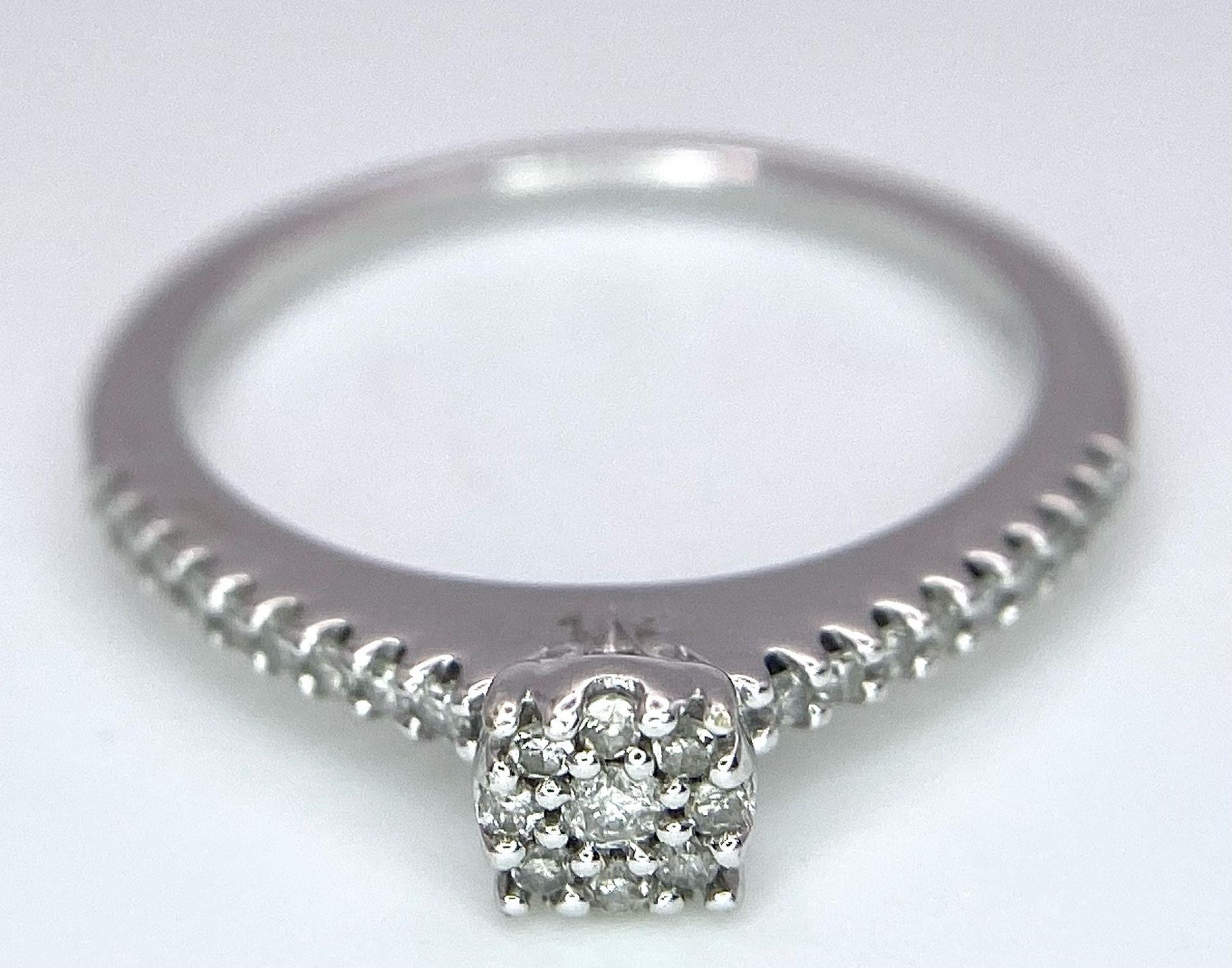 A 9K White Gold Diamond Cluster Ring. 0.15ctw, size L, 2g total weight. Ref: 8411 - Image 6 of 11