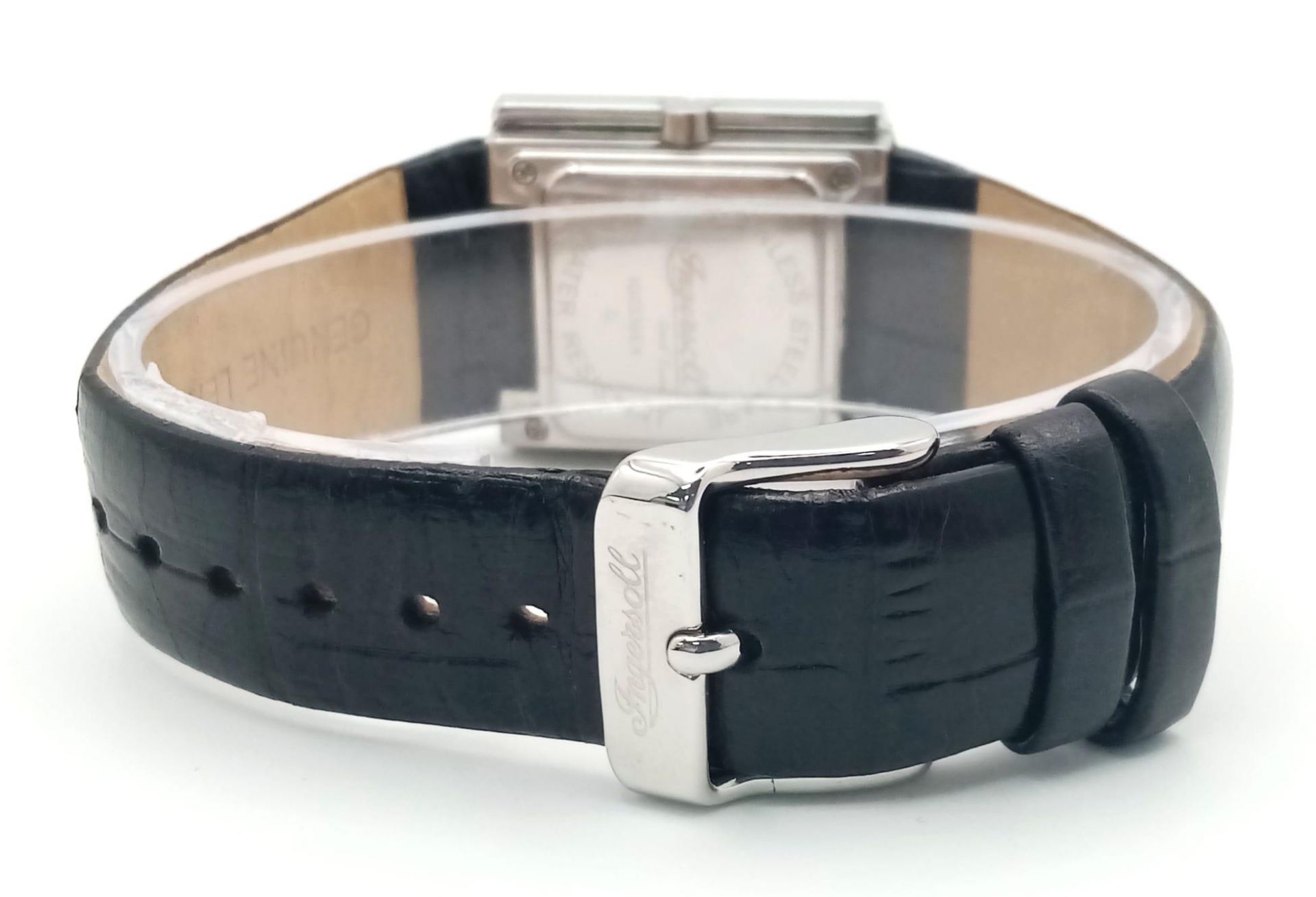 An Ingersoll Hidden Quartz Ladies Watch. Black leather strap. Rectangular hidden case - 27mm. Silver - Image 5 of 7