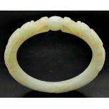 An Antique Chinese Pale Green Double Dragon Jade Bangle. 63mm inner diameter.