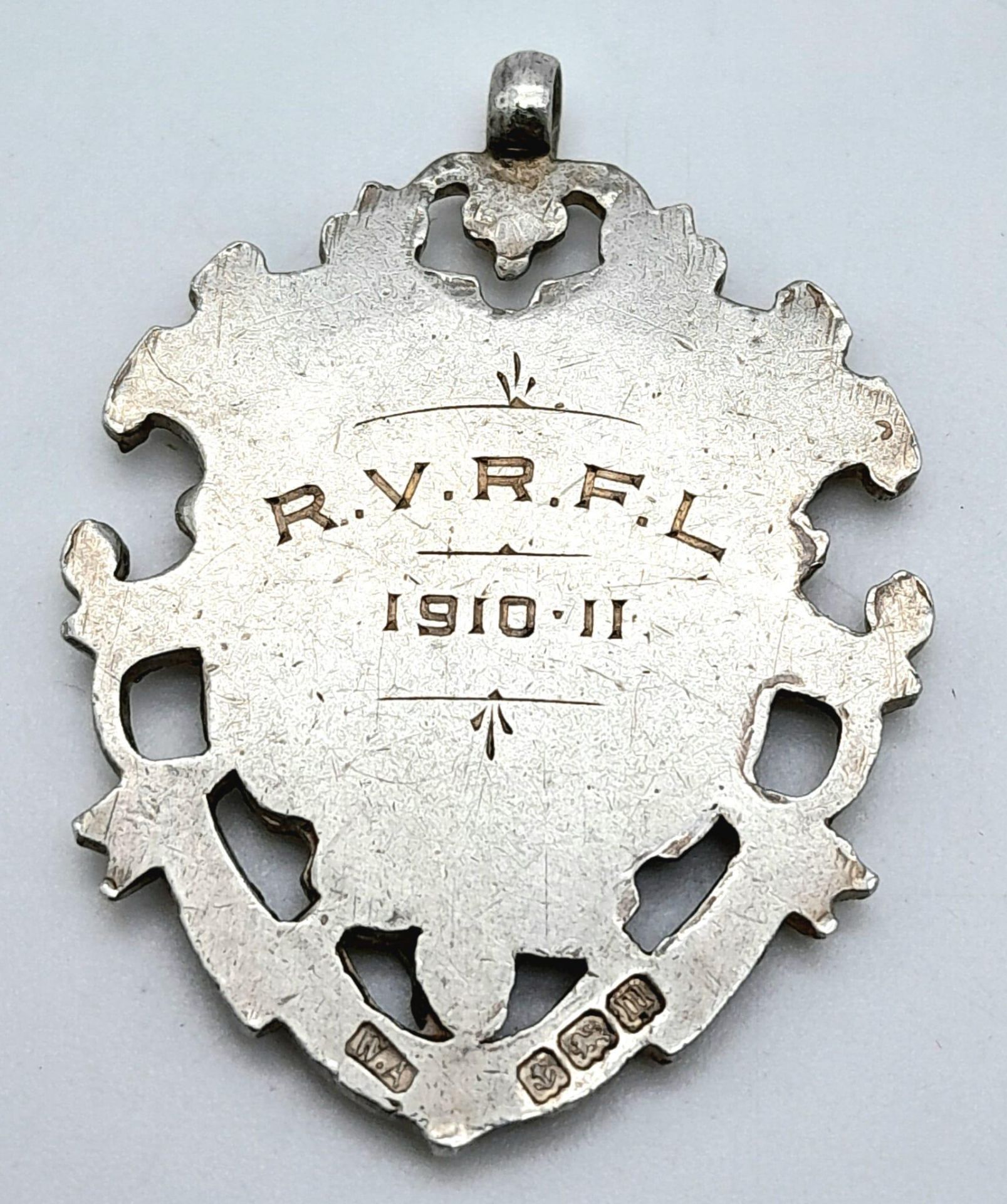 A fine quality silver and 9k gold watch fob medallion, engraved on the reverse: ‘RVRFL 1910-11’. - Image 3 of 6