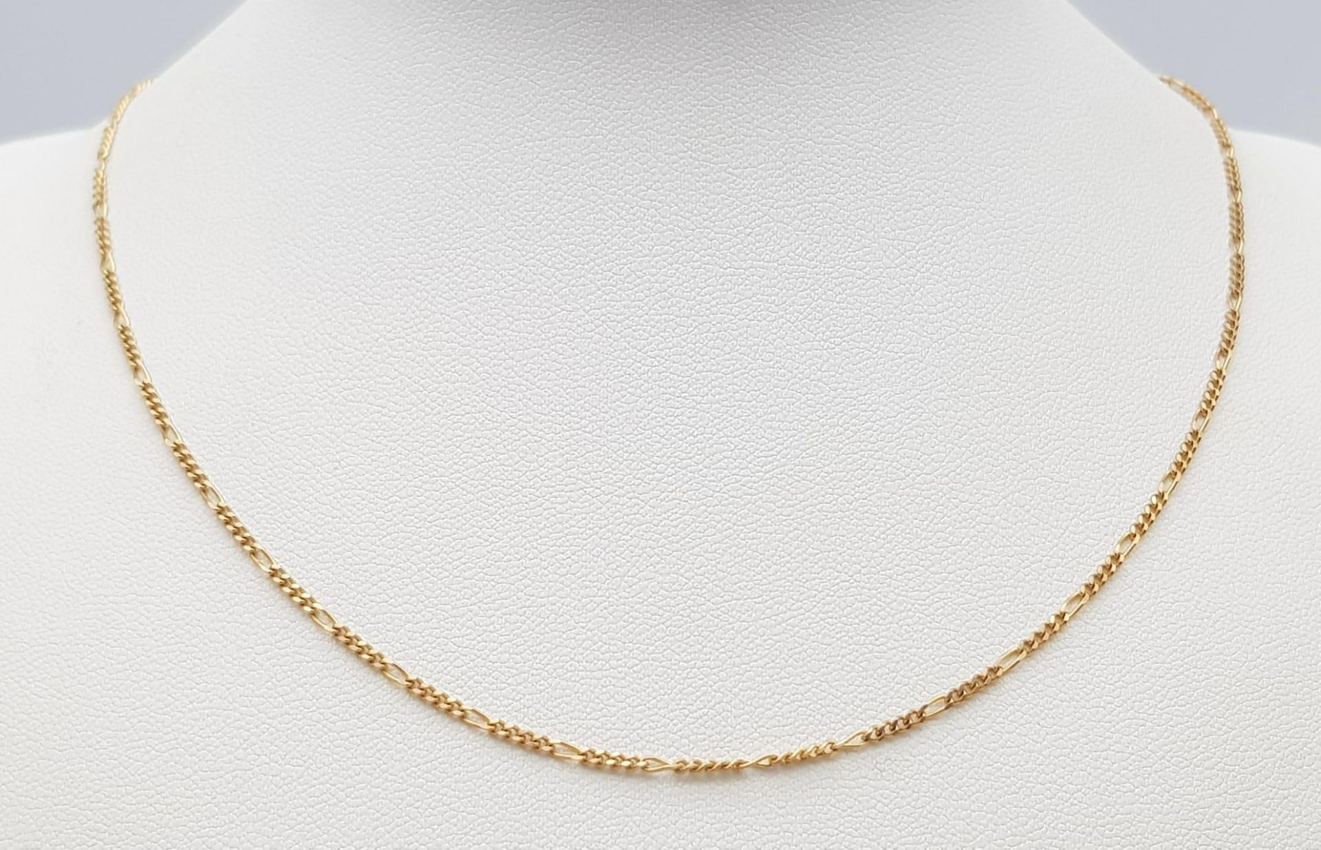 A 9K Yellow Gold Disappearing Necklace. 40cm. 2.2g weight.