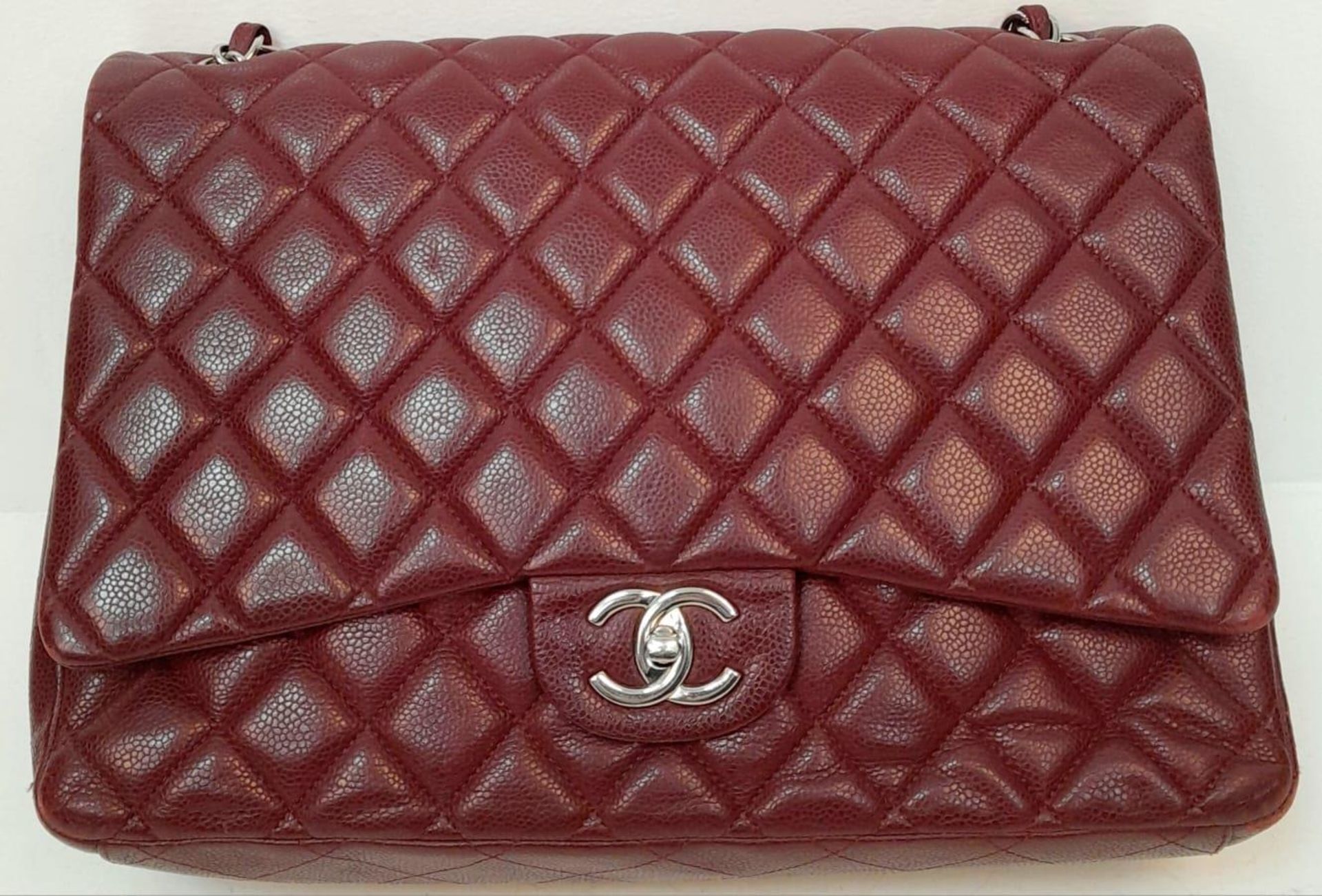 A Chanel Burgundy Jumbo Classic Double Flap Bag. Quilted leather exterior with silver-toned - Bild 2 aus 16