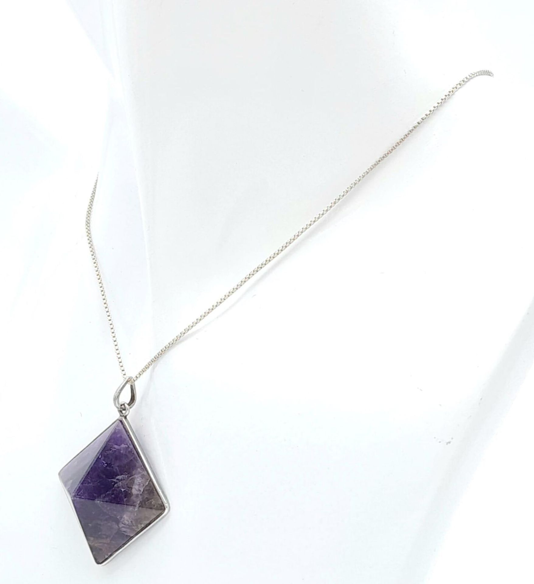 A Sterling Silver Pyramid Cut Amethyst Pendant Necklace. 37cm Length. Amethyst Measures 2cm Width. - Image 7 of 10