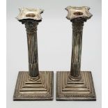 A PAIR OF SILVER CANDLESTICKS IN THE CORINTHIAN COLUMN STYLE , WOULD CLEAN UP WELL! 1150gms TOTAL