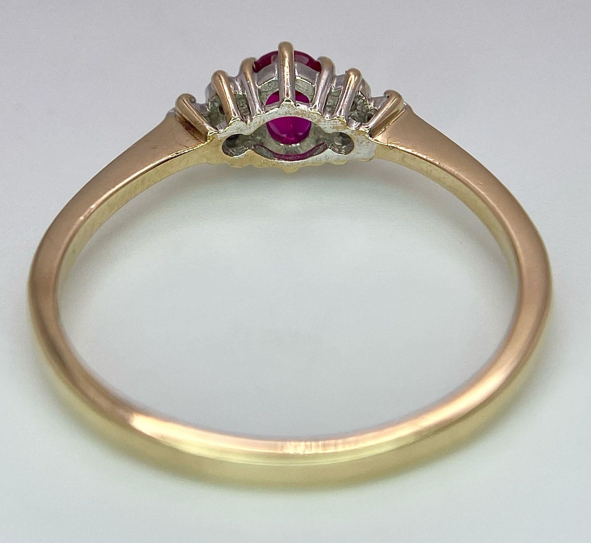 A 9K Yellow Gold Diamond & Red Stone (probably ruby) Ring. Size S, 2g total weight. Ref: 8418 - Image 5 of 7