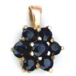 A 9K Yellow Gold Blue Stone (probably sapphire) Cluster Pendant. 1.4cm length, 1.1g total weight.