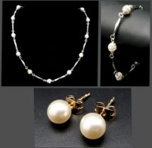 A truly elegant, silver and 14 K white gold plated, Mallorca pearl necklace, bracelet and earrings