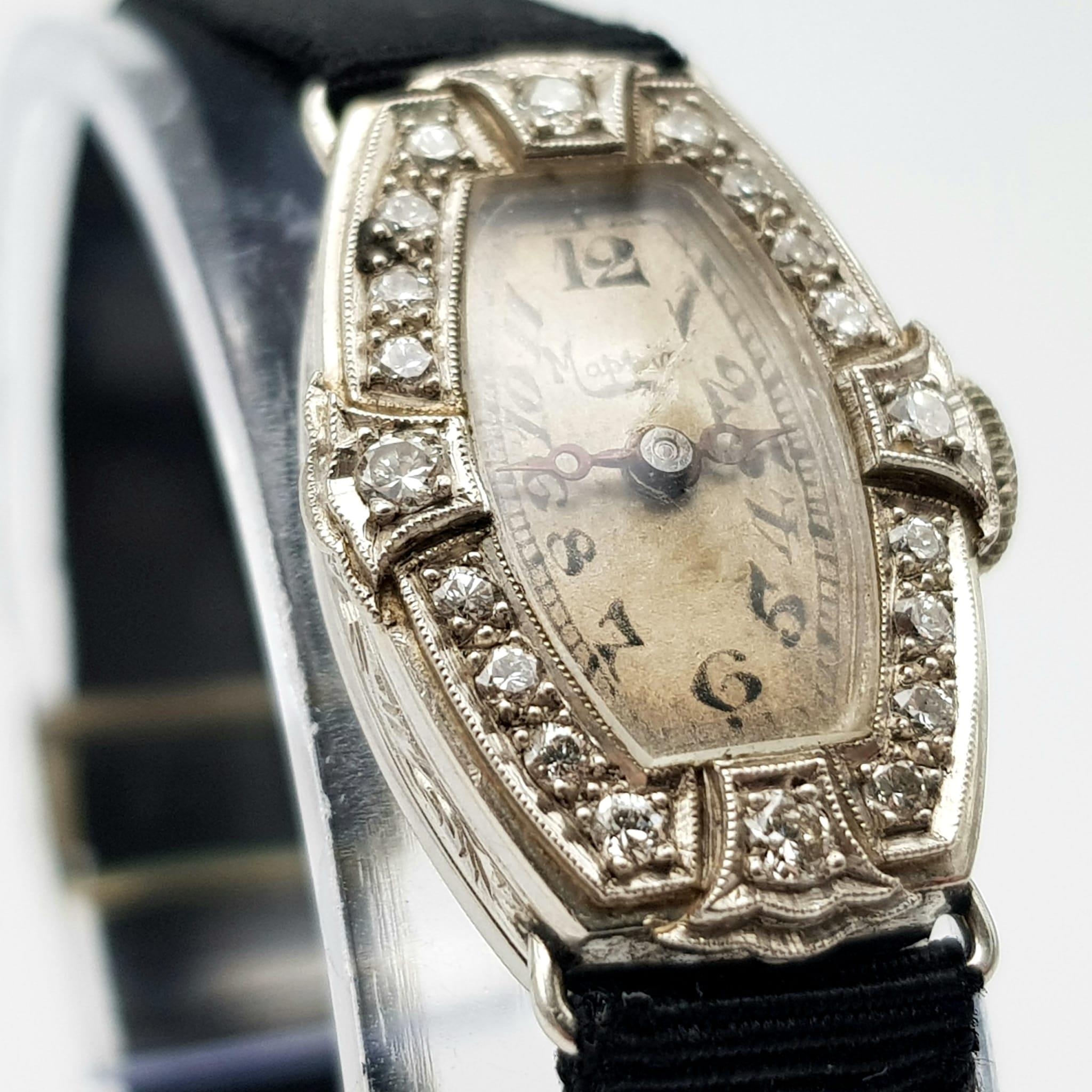 A 1920s Art Deco Mappin and Webb Platinum and Diamond Cocktail Ladies Watch. Original textile strap. - Image 4 of 8