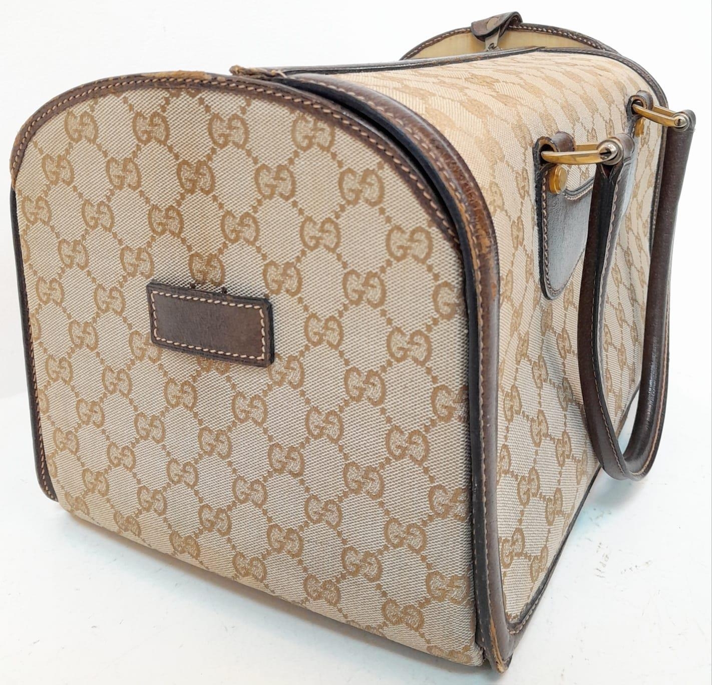 A Gucci Monogram Hard Train Vanity Case. Textile exterior with leather trim, two rolled leather - Image 5 of 7