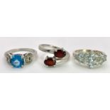 Three 925 Sterling Silver Gemstone Rings: Topaz - Size N, Garnet - Size P and Aquamarine- Size N.