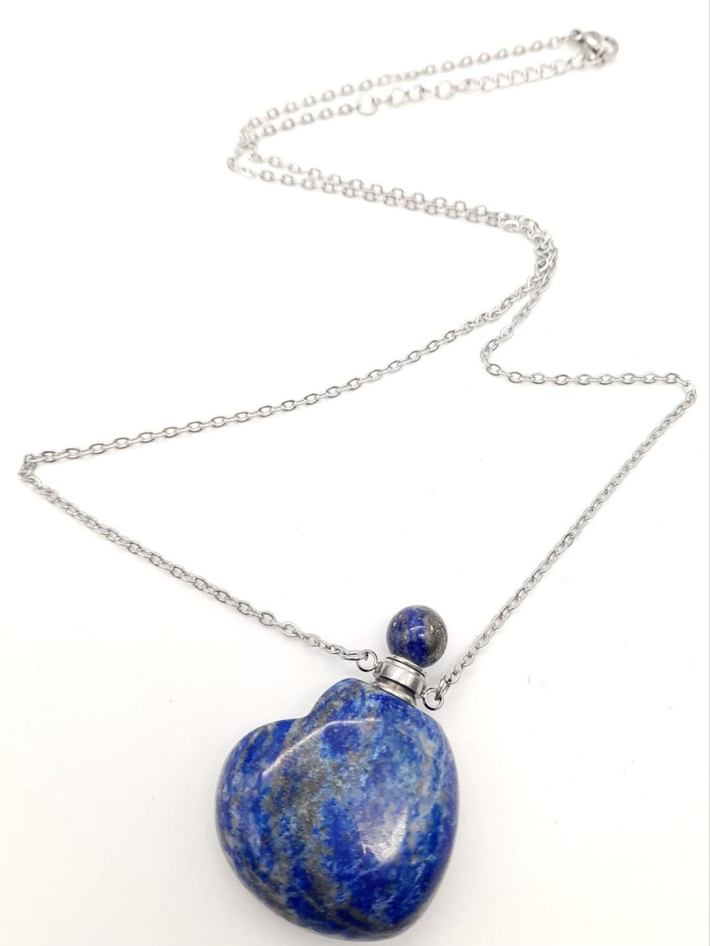 A Lapis Lazuli Bottle Pendant on a White Chain. 4cm and 50cm.