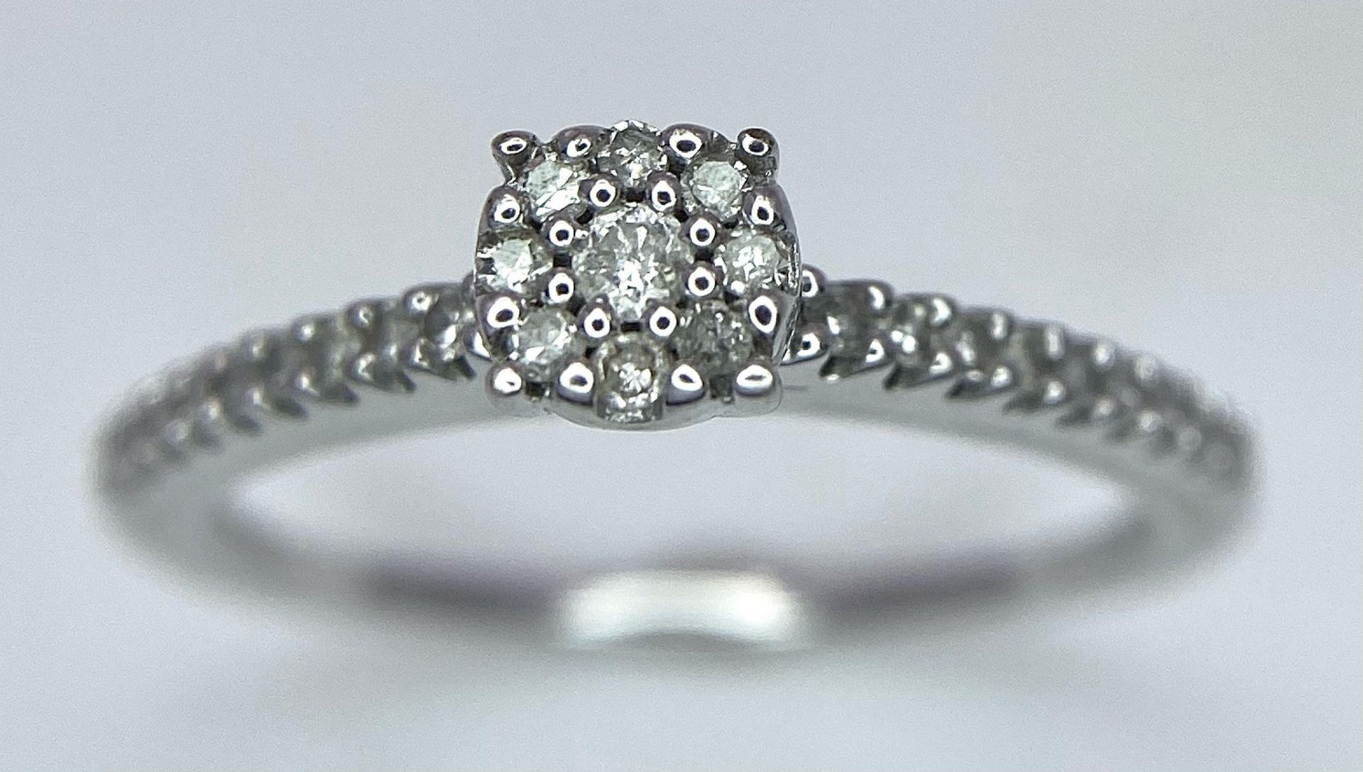 A 9K White Gold Diamond Cluster Ring. 0.15ctw, size L, 2g total weight. Ref: 8411 - Image 2 of 11