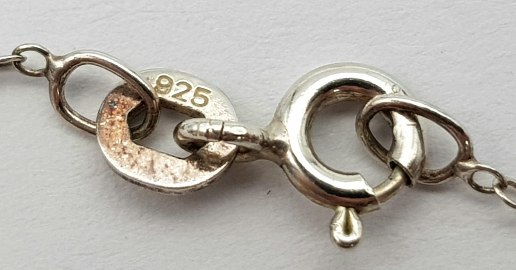 A vintage 925 silver bull pendant on silver belcher chain. Total weight 3.1G. Total length 42cm. - Image 6 of 8