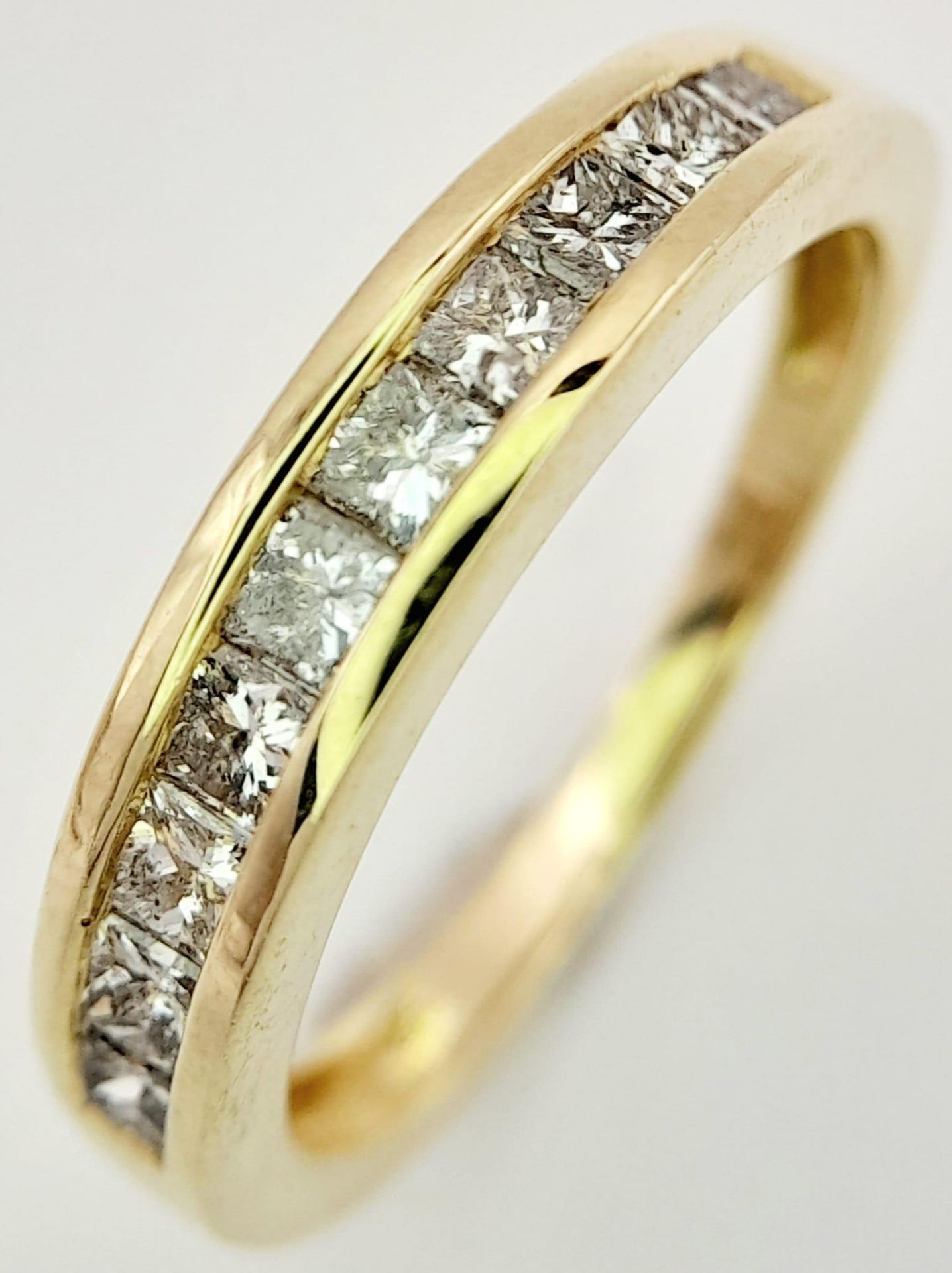 A 9K Yellow Gold Diamond Set Half Eternity Ring. 0.40ctw, Size N, 2.5g total weight. Ref: 8419