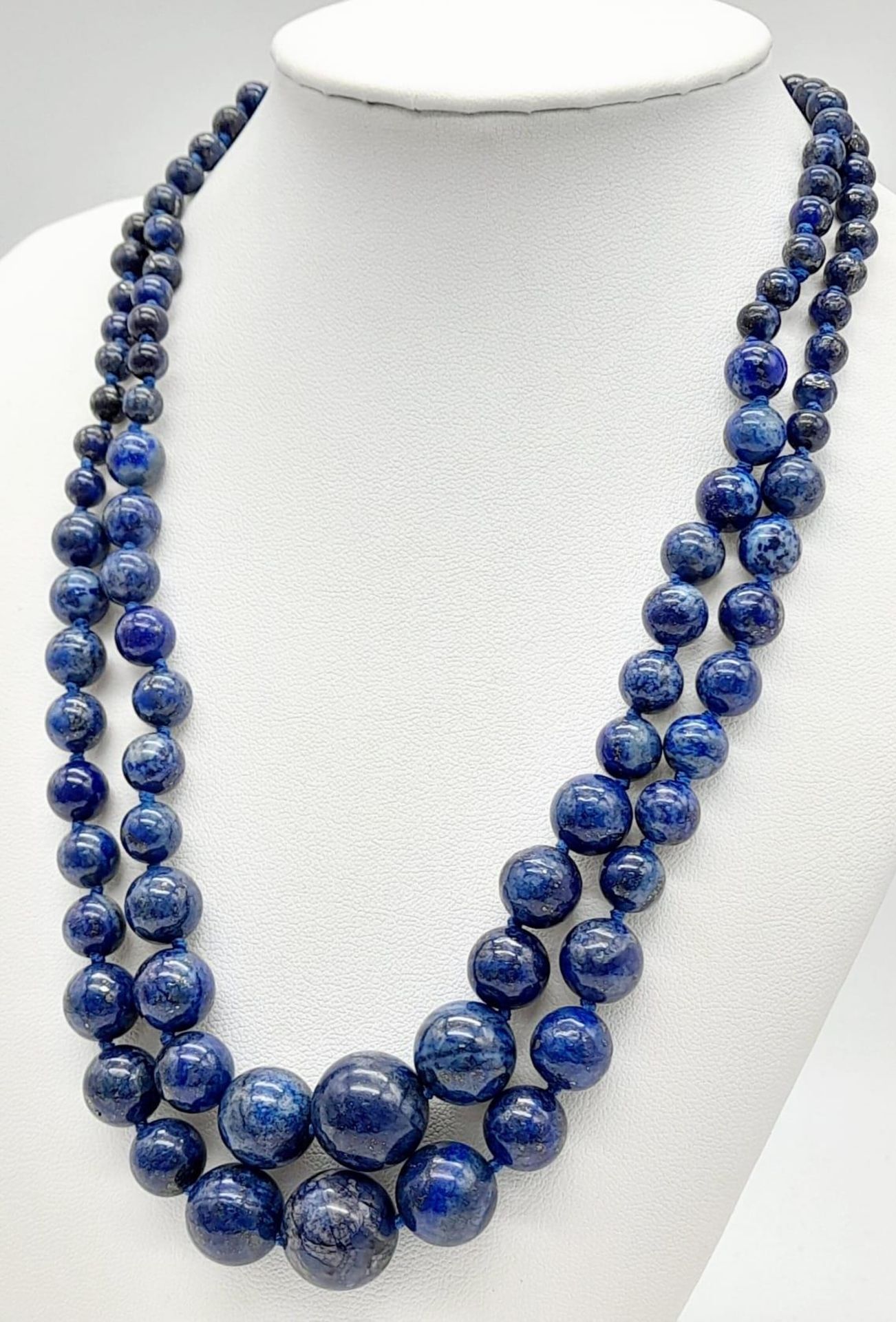 A Classic Lapis Lazuli Double Row Graduated Bead Necklace. 40-44cm length. Largest lapis bead - - Image 2 of 9