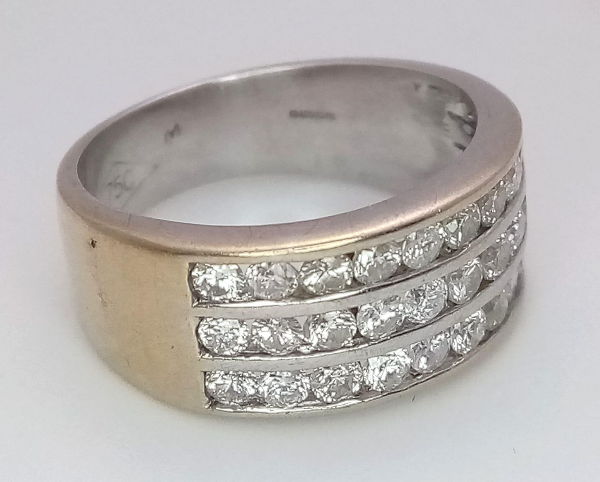 A well made 18 K yellow gold ring with three channels filled with round cut diamonds. Size: H, - Image 10 of 18