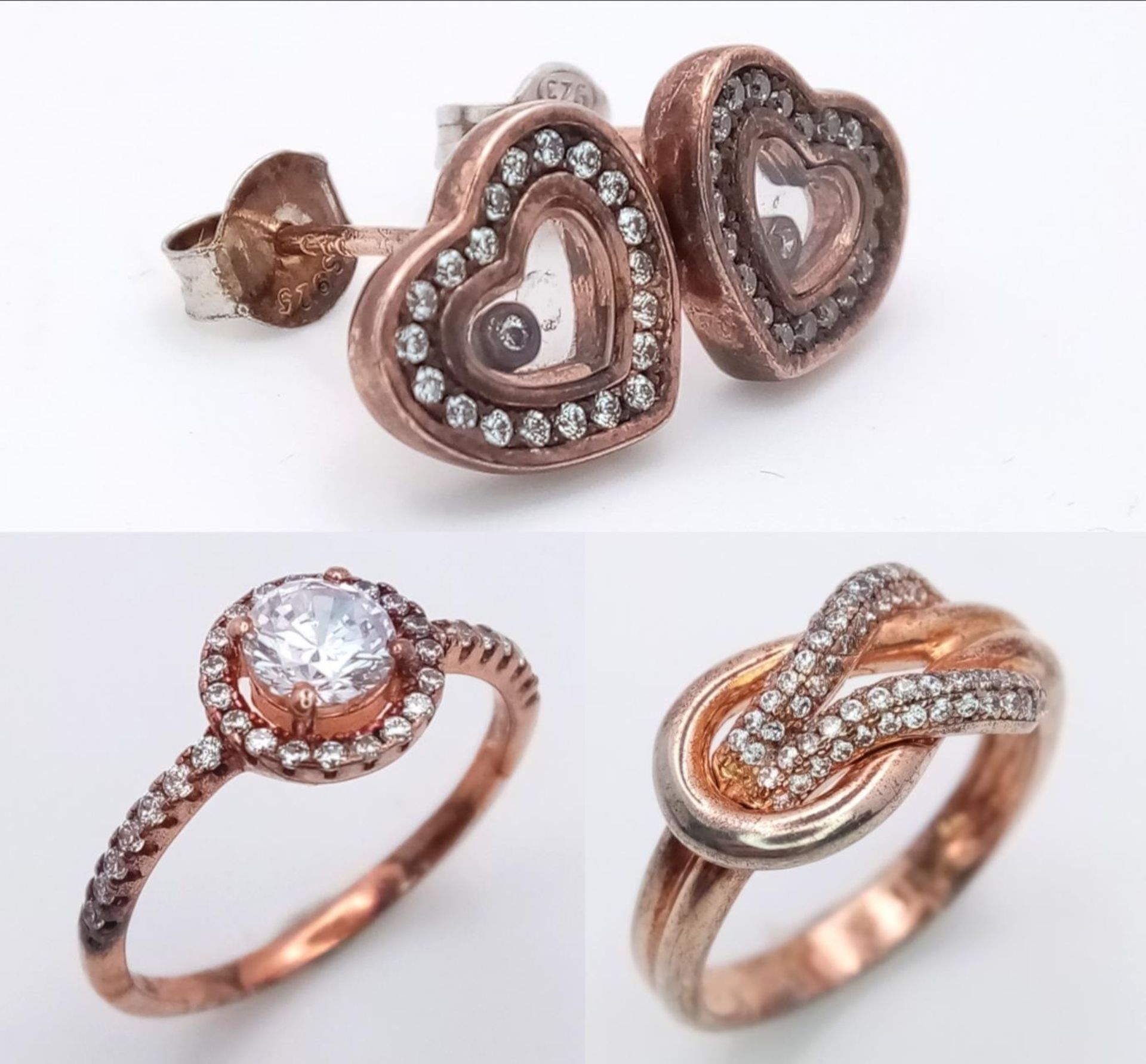 A sterling silver group of TWO rings and ONE pair of earrings, with rose gold vermeil finish and - Bild 2 aus 6