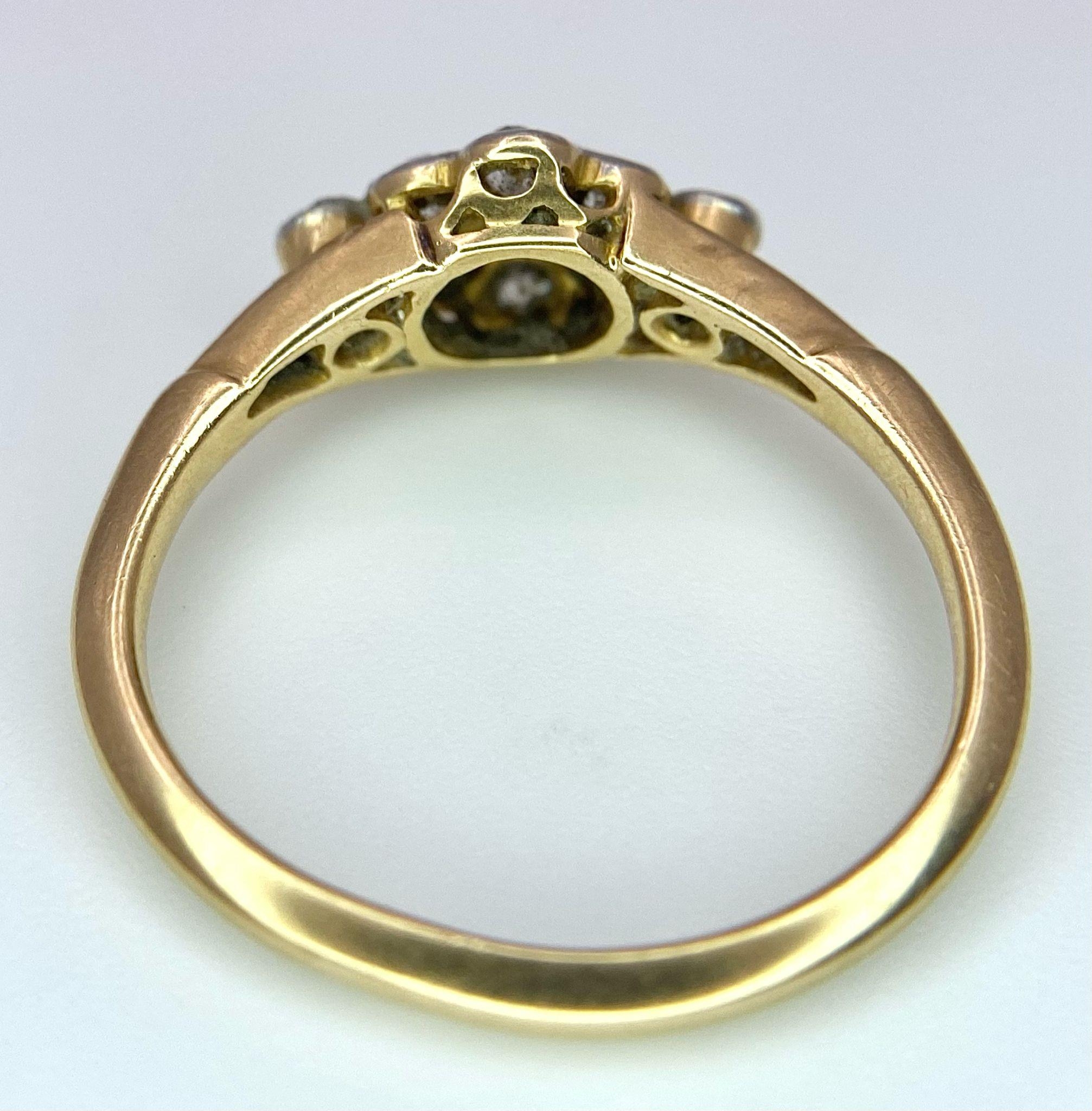 A VINTAGE 18K GOLD DIAMOND CLUSTER RING (ONE STONE MISSING REFLECTED IN PRICE) . 2.4gms size J - Image 8 of 11