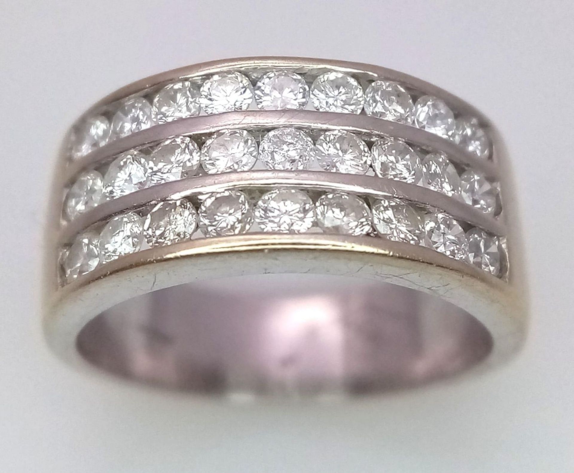 A well made 18 K yellow gold ring with three channels filled with round cut diamonds. Size: H, - Image 5 of 18