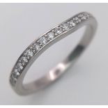 A PLATINUM DIAMOND HALF ETERNITY RING. 0.25CTW. 3.2G SIZE M