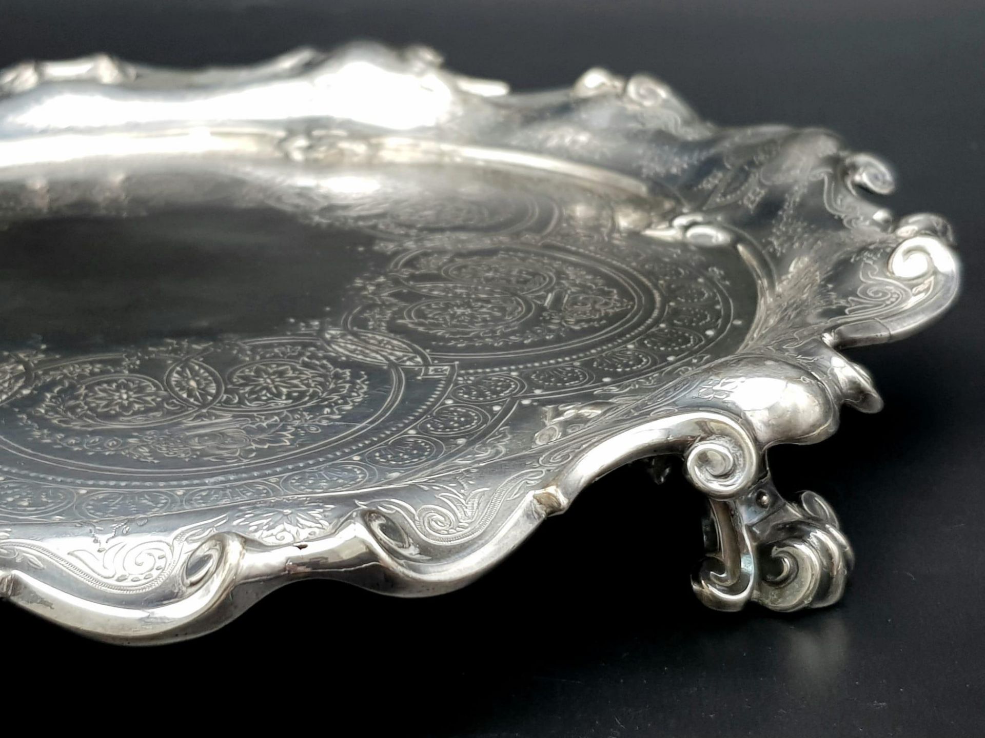 A 761gms solid silver Salva with scrolled edges and hand chased intricate decoration and - Image 4 of 7